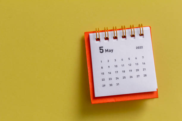 istock Desktop calendar for May 2022 for planning.Spring is in the yard. 1389449543