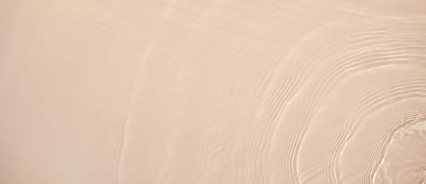 istock banner background transparent beige clear water surface texture 1389451271