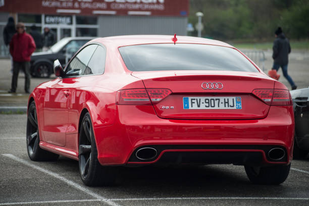 Rear view of red Audi A5 parked in the street stock photo
