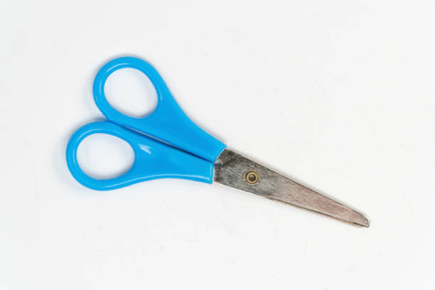 istock Blue scissors isolated on white background, small a pair of scissors, cutting tool top view 1389454638