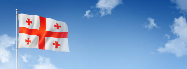 istock Georgian flag isolated on a blue sky. Horizontal banner 1389454929
