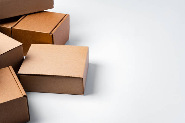 istock Lot of cardboard boxes on white background 1389455109