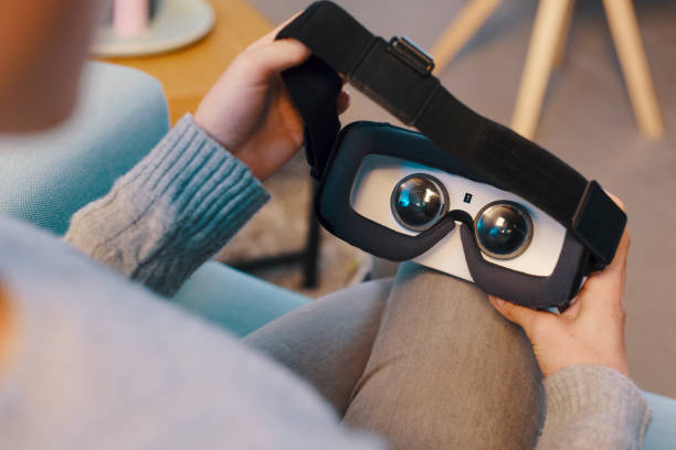 Woman holding a VR headset