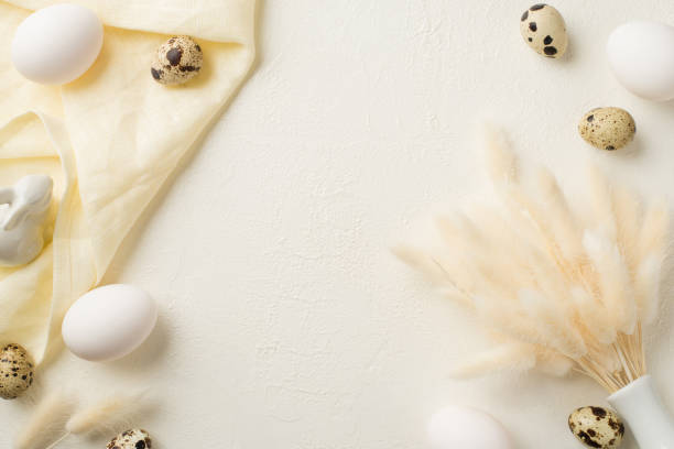 istock Top view photo of easter decorations white vase with lagurus flowers ceramic bunny easter eggs and cloth on isolated white background with blank space 1389457725