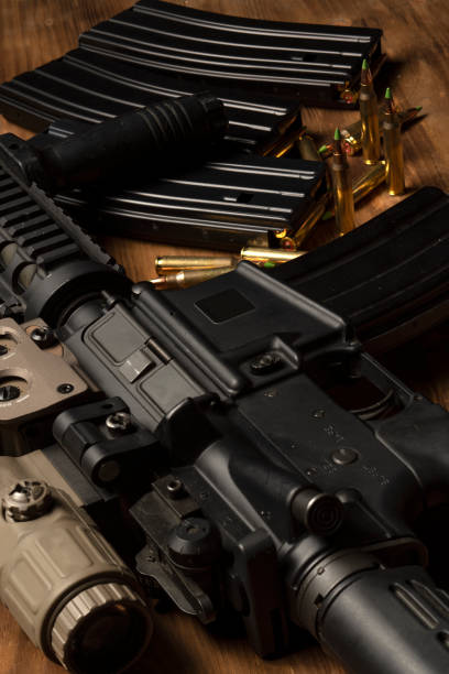istock Rifle with optical sight and laser device 1389462830