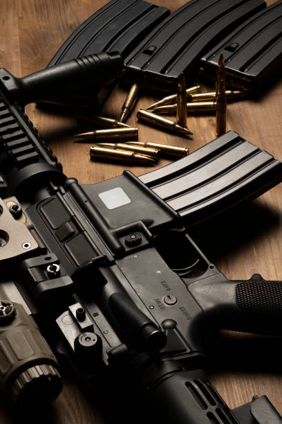 istock Rifle with optical sight and laser device 1389462832