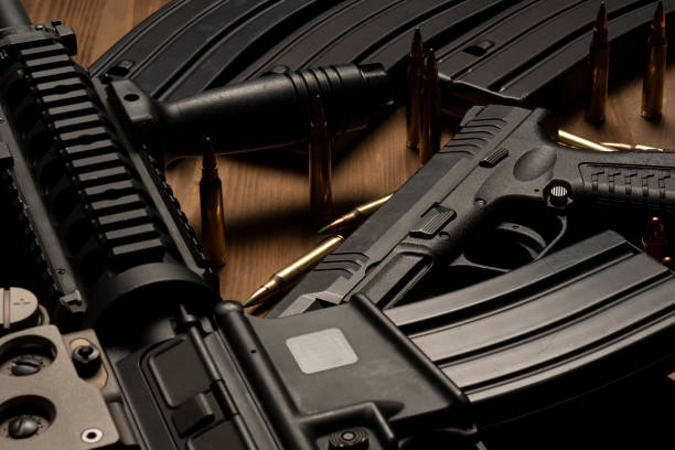 istock Rifle with optical sight and laser device 1389462860