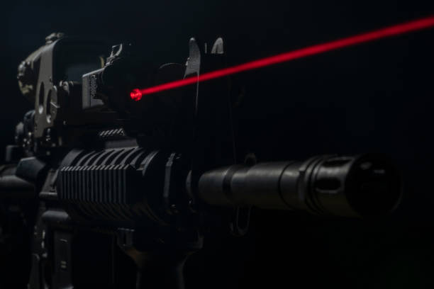 istock Rifle with optical sight and laser device 1389462878