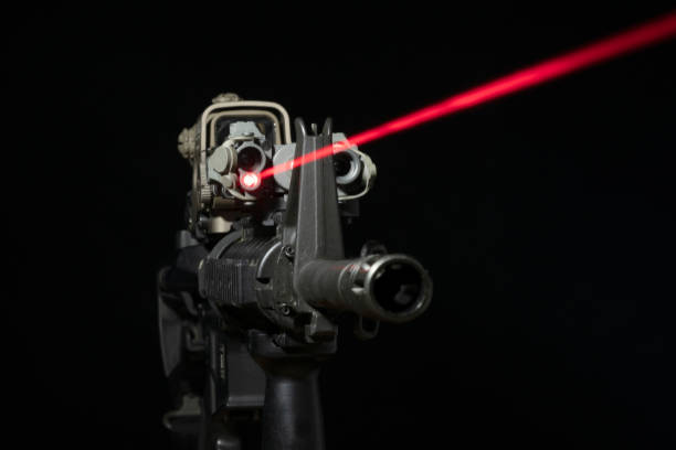 istock Rifle with optical sight and laser device 1389462879