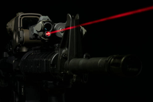 istock Rifle with optical sight and laser device 1389462885