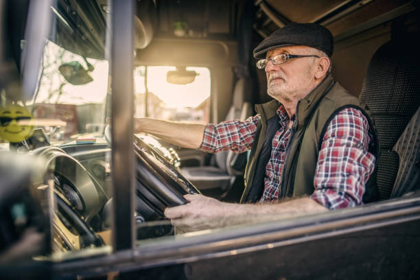istock A mature man driving a truck 1389463685