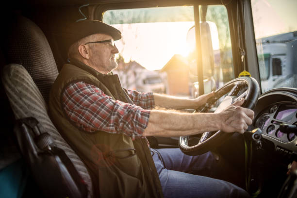 istock A mature man driving a truck 1389464002