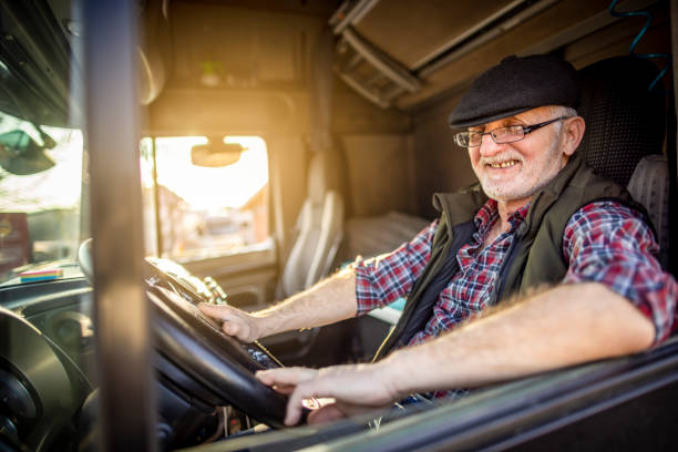 istock A mature man driving a truck 1389464031