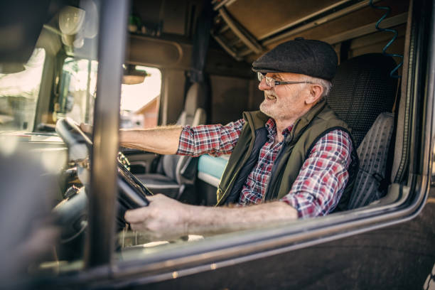 istock A mature man driving a truck 1389465563