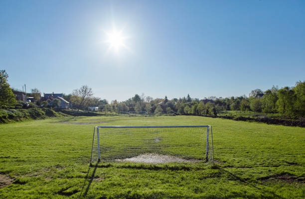 istock soccer field in the rural 1389471285
