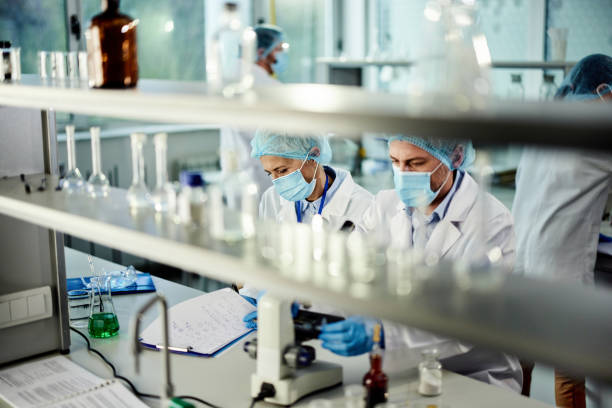 istock Scientists working on scientific research in laboratory. 1389472712