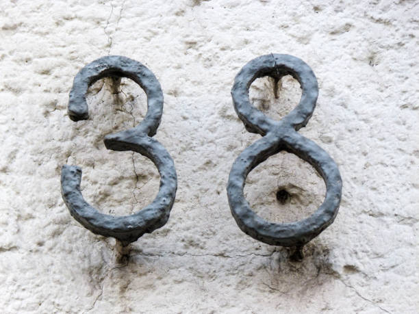 istock Metal home number on a wall 1389474449