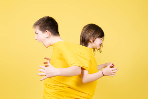 istock Friends wearing big size yellow shirt 1389478794