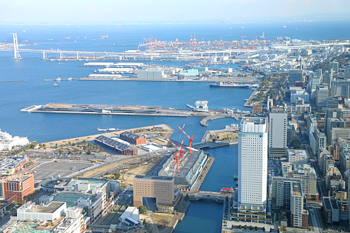 This is a cityscape of Yokohama Minato Mirai 21 in Yokohama City, Kanagawa Prefecture.\nYokohama Red Brick Warehouse, Yokohama Landmark Tower, Queen's Square Yokohama, Cosmo Clock, etc. can be seen in this photo from the Yokohama Port side.