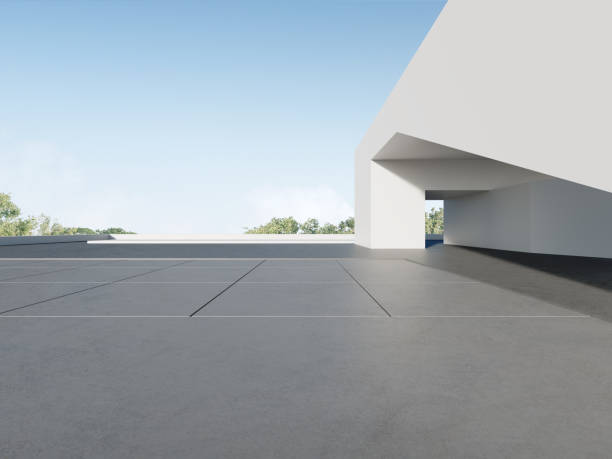 istock 3d render of futuristic concrete architecture with car park, empty cement floor. 1389479564