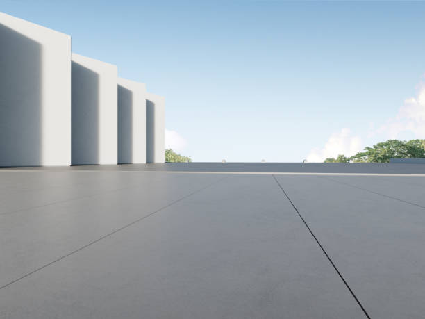 istock 3d render of futuristic concrete architecture with car park, empty cement floor. 1389479565