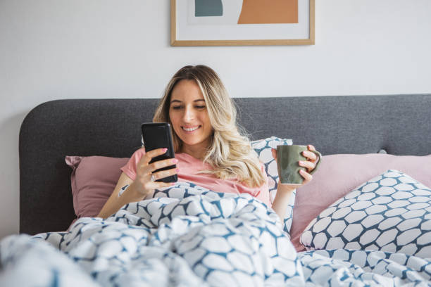 istock Young woman waking up 1389479748