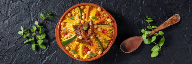 istock Meat and vegetable couscous panorama. Traditional Moroccan dish 1389479769