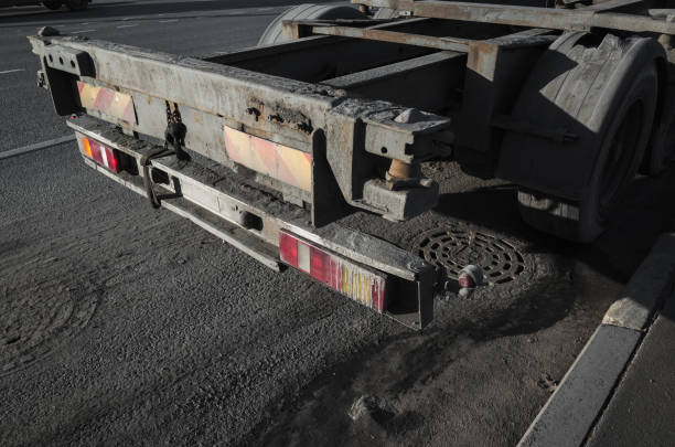 istock Back part with taillight of empty truck cargo trailer 1389479937