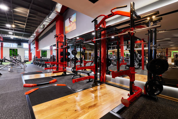 istock Gym without people with large group of exercise machines. 1389480719