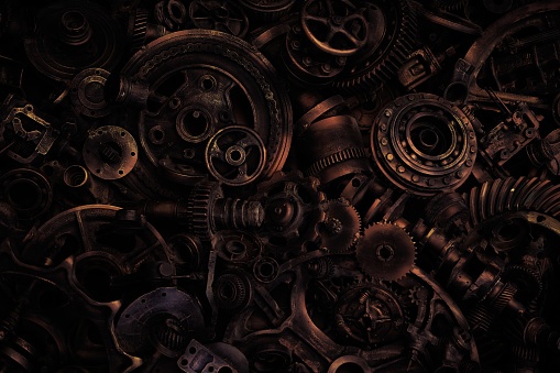 steampunk scrap metal for recycling background. a lot of different rusty industrial part detail for melt and reused