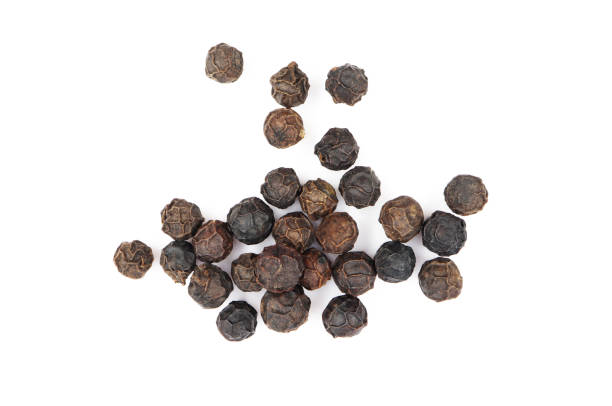istock top view, a pile of black pepper seeds as a spice. 1389483228