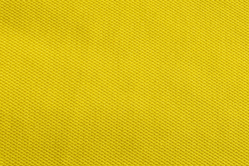Yellow fabric cloth polyester texture and textile background.