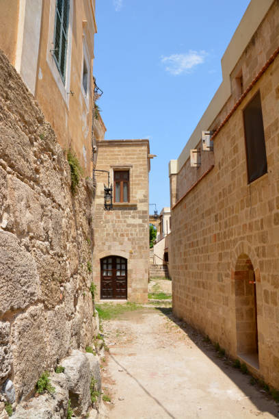 istock greek ancient houses with arched windows and doors, rhodes island 1389483844