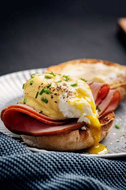 istock Eggs Benedict with Ham and Hollandaise Sauce 1389483961