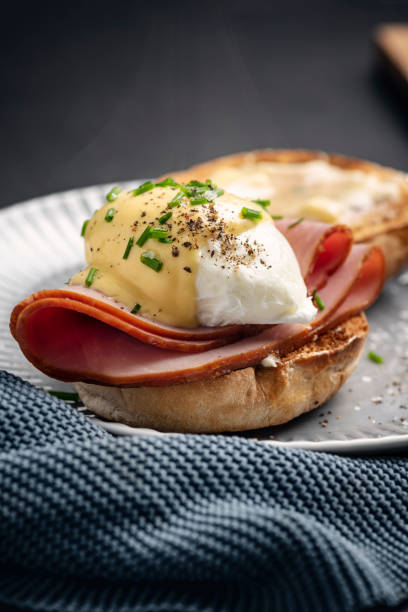 istock Eggs Benedict with Ham and Hollandaise Sauce 1389483968