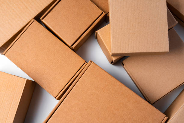 istock Lot of cardboard boxes on white background 1389484014