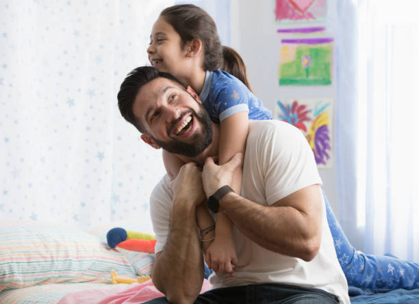 Father and daughter sharing some quality time stock photo