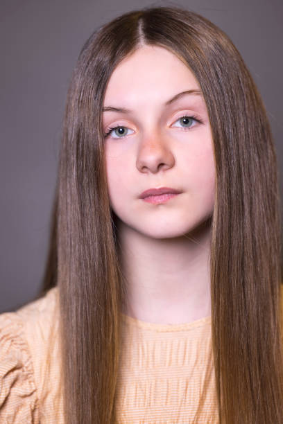 istock Brunette girl with green eyes 1389487682