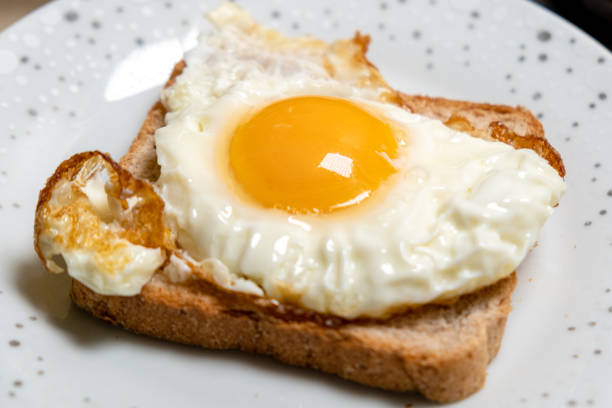 istock Toast sandwich with fried egg on a plate. Light, quick snack. 1389491159