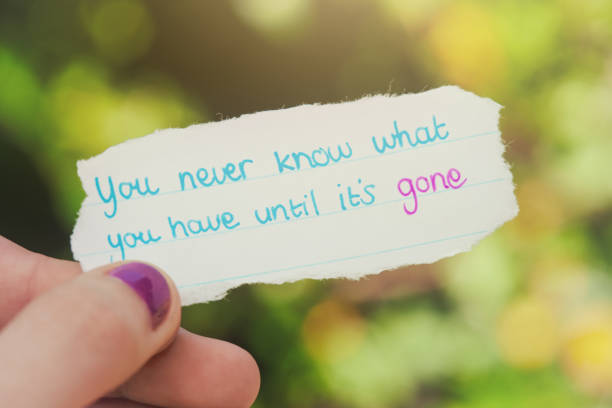 istock You never know what you have until it's gone, says nostalgic regretful note held in hand 1389492132