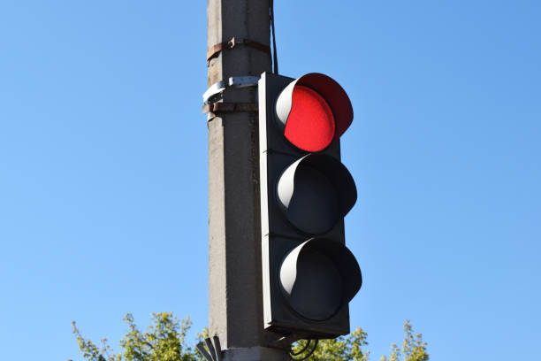 istock street tricolor traffic light with a burning red light 1389493464