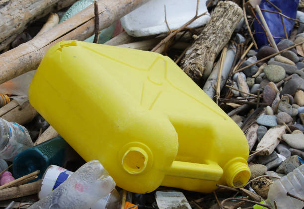 Yellow poly tank drifted to the shore