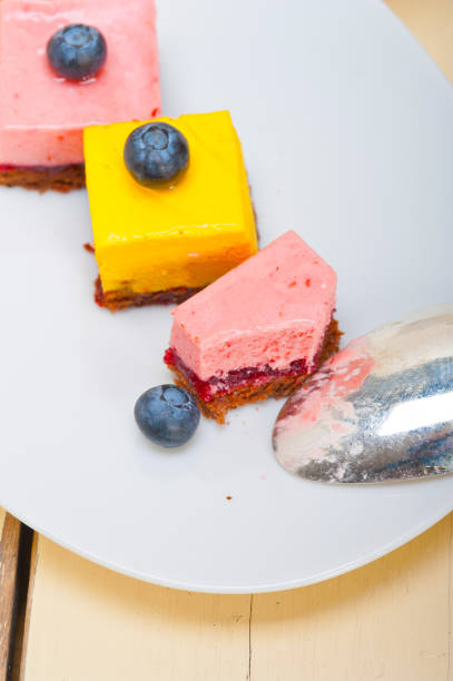 istock strawberry and mango mousse dessert cake 1389498716