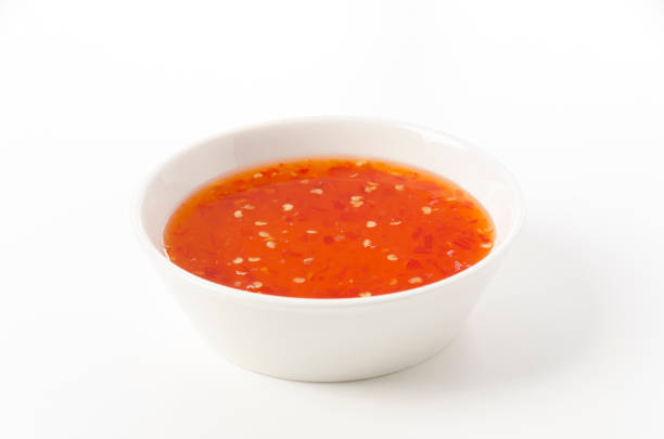 istock Sweet chili sauce on white background 1389500317