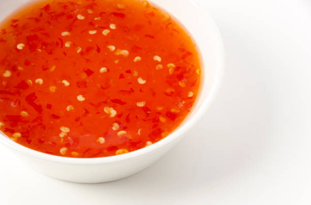 istock Sweet chili sauce on white background 1389500318