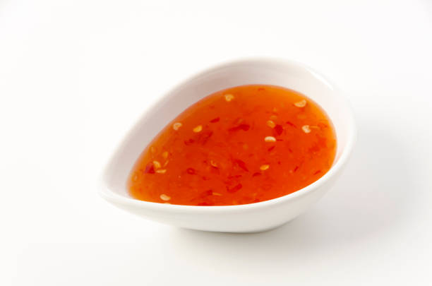 istock Sweet chili sauce on white background 1389500360