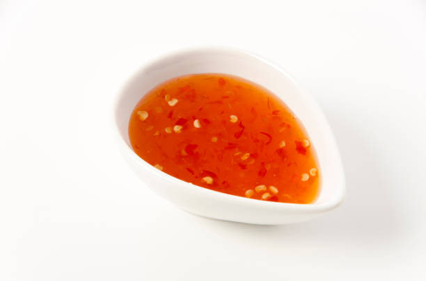 istock Sweet chili sauce on white background 1389500367