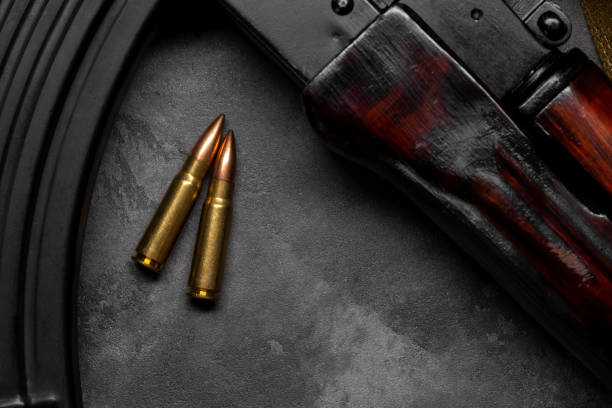 istock Bullets and Kalashnikov assault rifle 1389506194