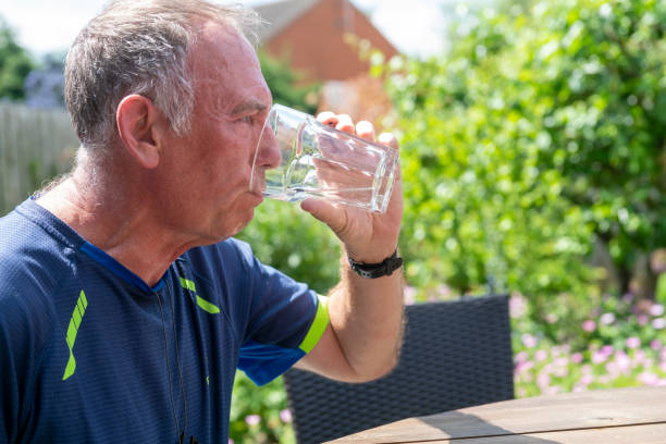 istock Senior man recovering after exercise in his back garden 1389507182