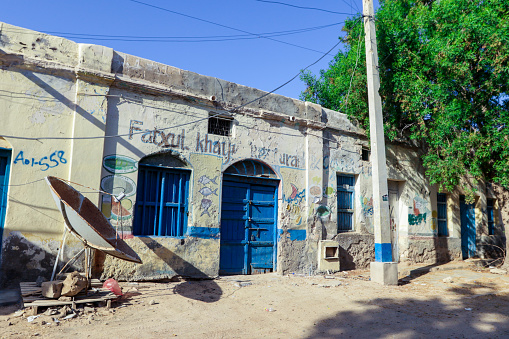 Berbera, Somaliland - November 10, 2019: One Floor Building with Blue Door in the Berbera City Center